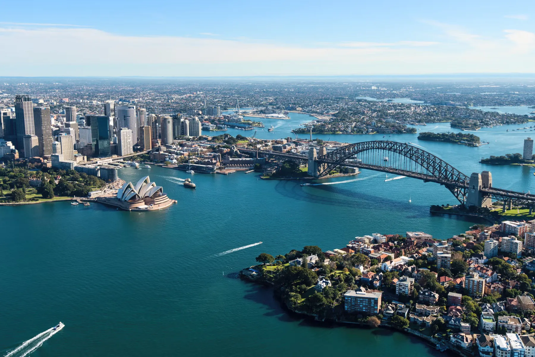Aerial view of Sydney Harbour, the CBD and surrounding suburbs