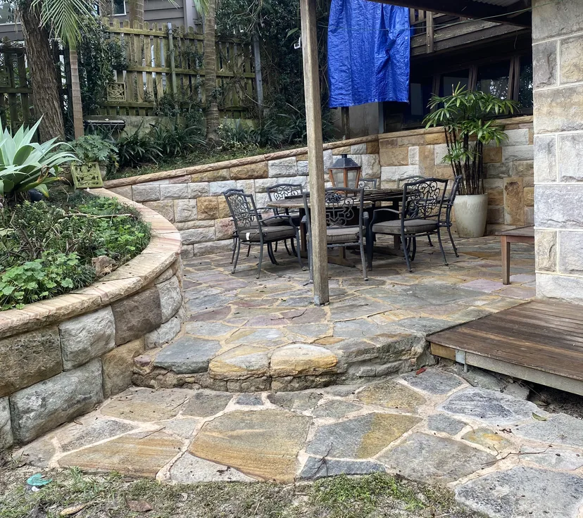Sandstone courtyard after pressure cleaning, natural stone tones restored