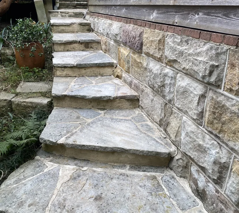 Sandstone garden steps after pressure cleaning, stone colour restored